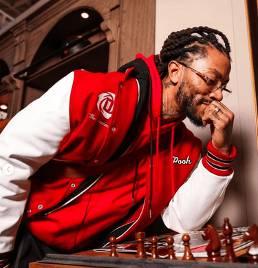 Man wearing Varsity jacket